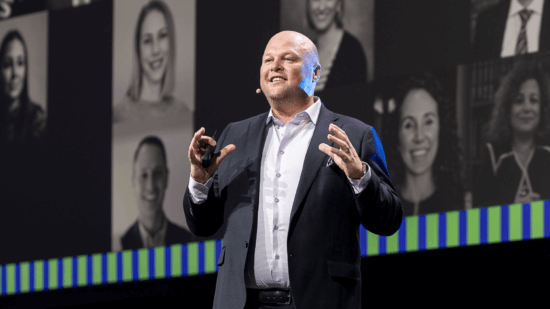 Clio CEO Jack Newton giving a keynote presentation on stage at ClioCon.