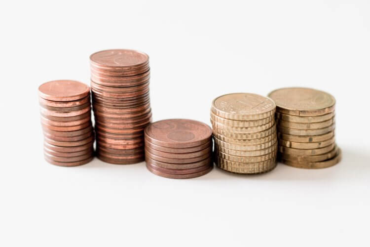 Photo of coins stacked symbolizing Law Firm profit sharing formulas