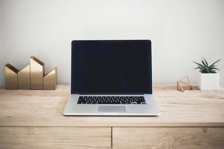 Laptop with locked screen on desk