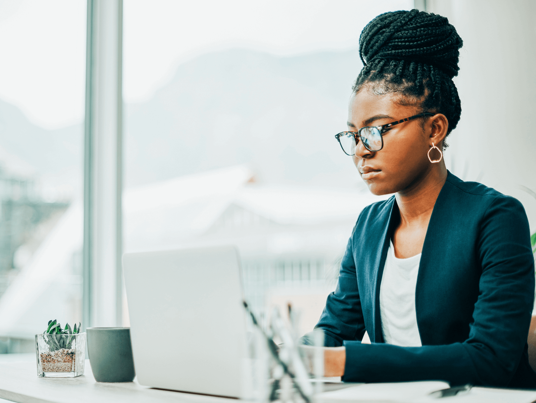 Corporate lawyer sitting in front of a laptop