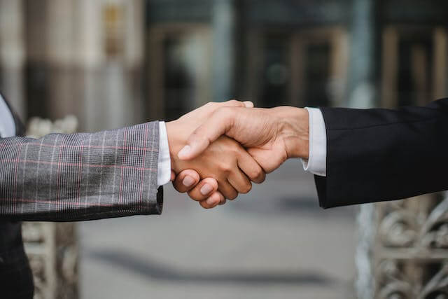 Lawyers shaking hands.